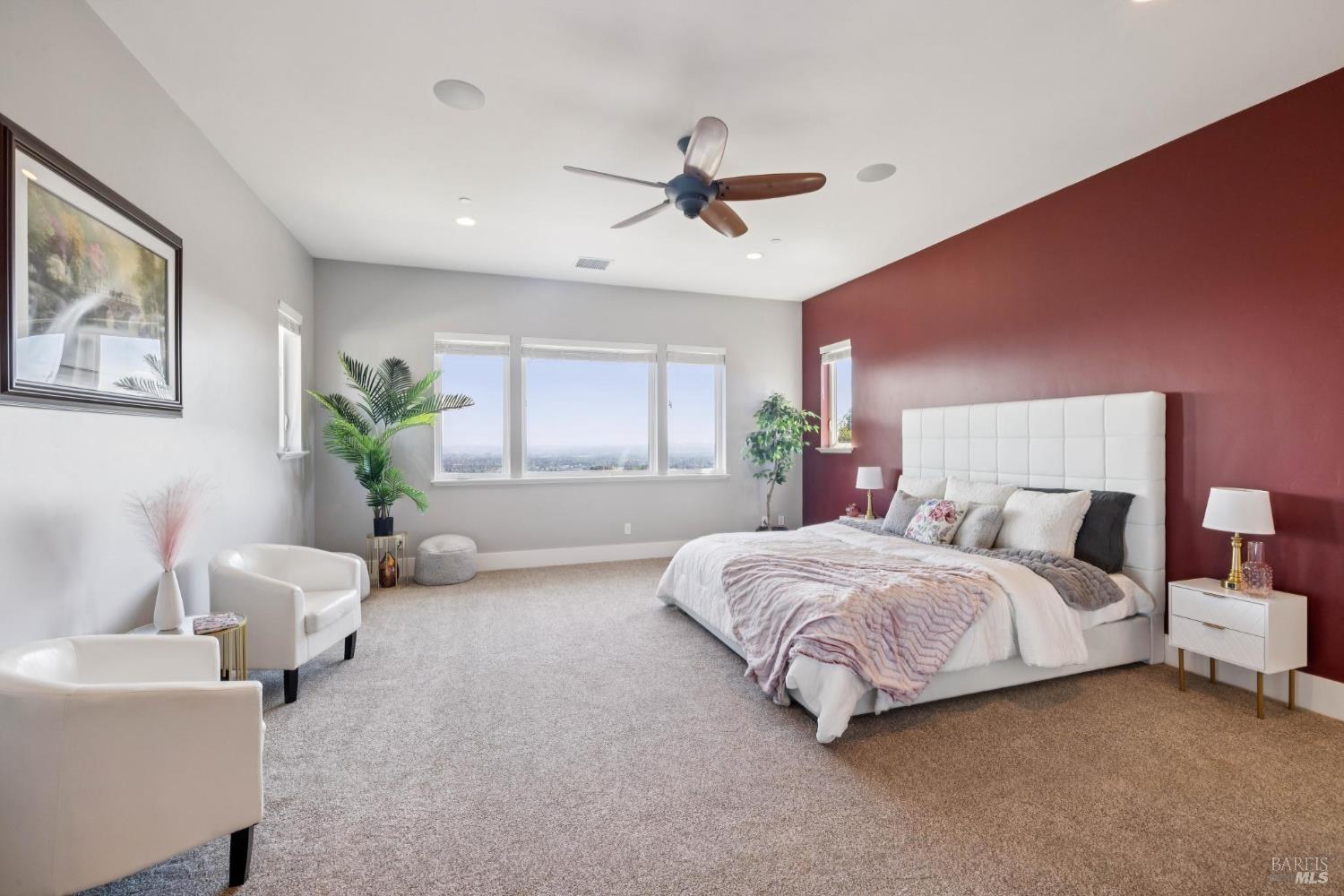 3882 Royal Manor Place Santa Rosa, CA 95404 - Photo 49 of 87 Spacious upstairs primary bedroom includes a walk-in closet and full bathroom. Enjoy bright light and clear views of Sonoma County's hills and mountains out the large dual pane window.