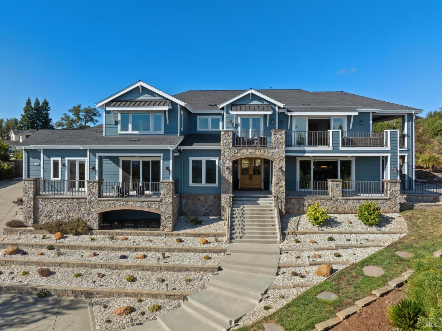 3882 Royal Manor Place Santa Rosa, CA 95404 - Photo 84 of 87 As you approach this stately home you are welcomed by the magnificent stone work and gracious porch.