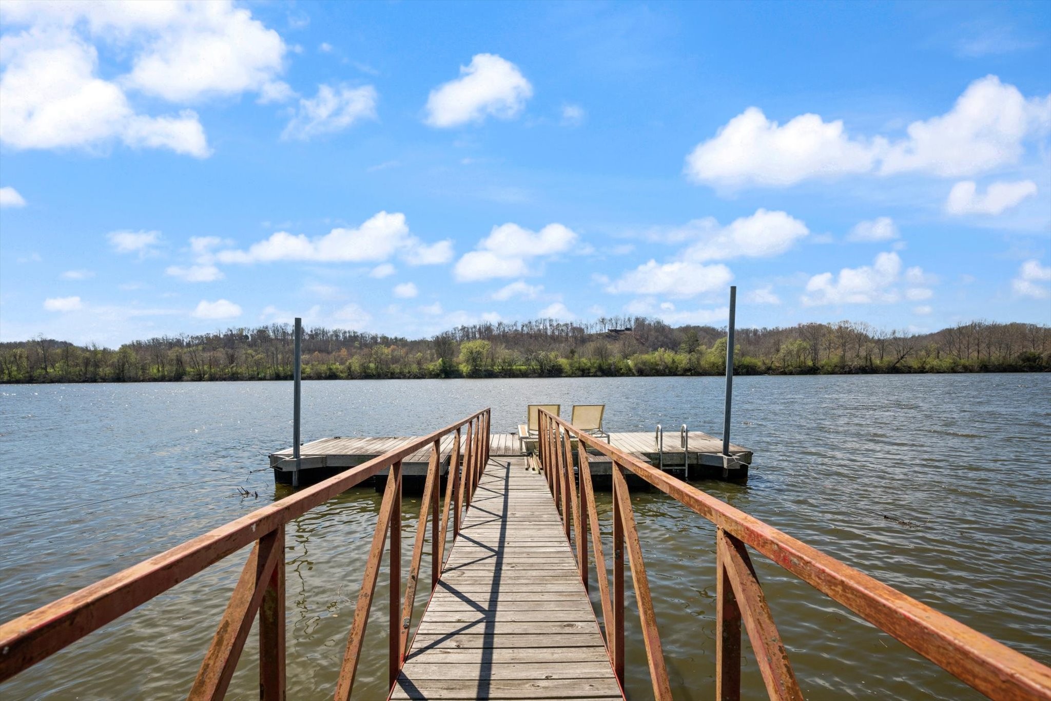 a view of a lake from a balcony