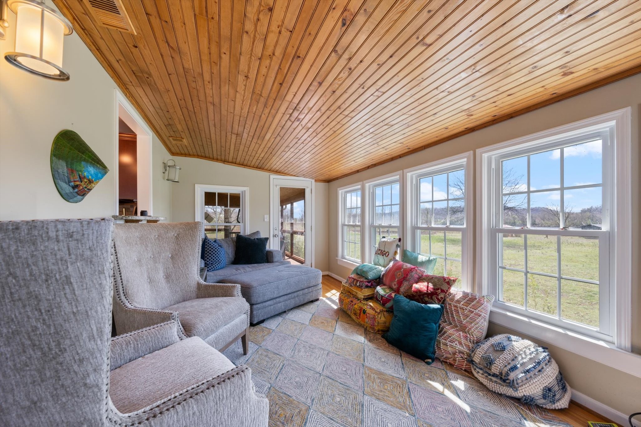 501 Chapmansboro Road Ashland City, TN 37015 - Photo 11 of 36 a living room with furniture and a floor to ceiling window