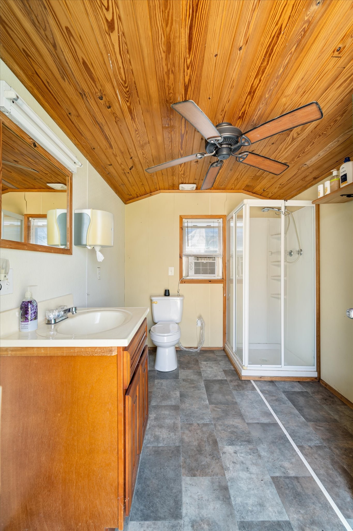 501 Chapmansboro Road Ashland City, TN 37015 - Photo 23 of 36 a bathroom with a sink a toilet and shower