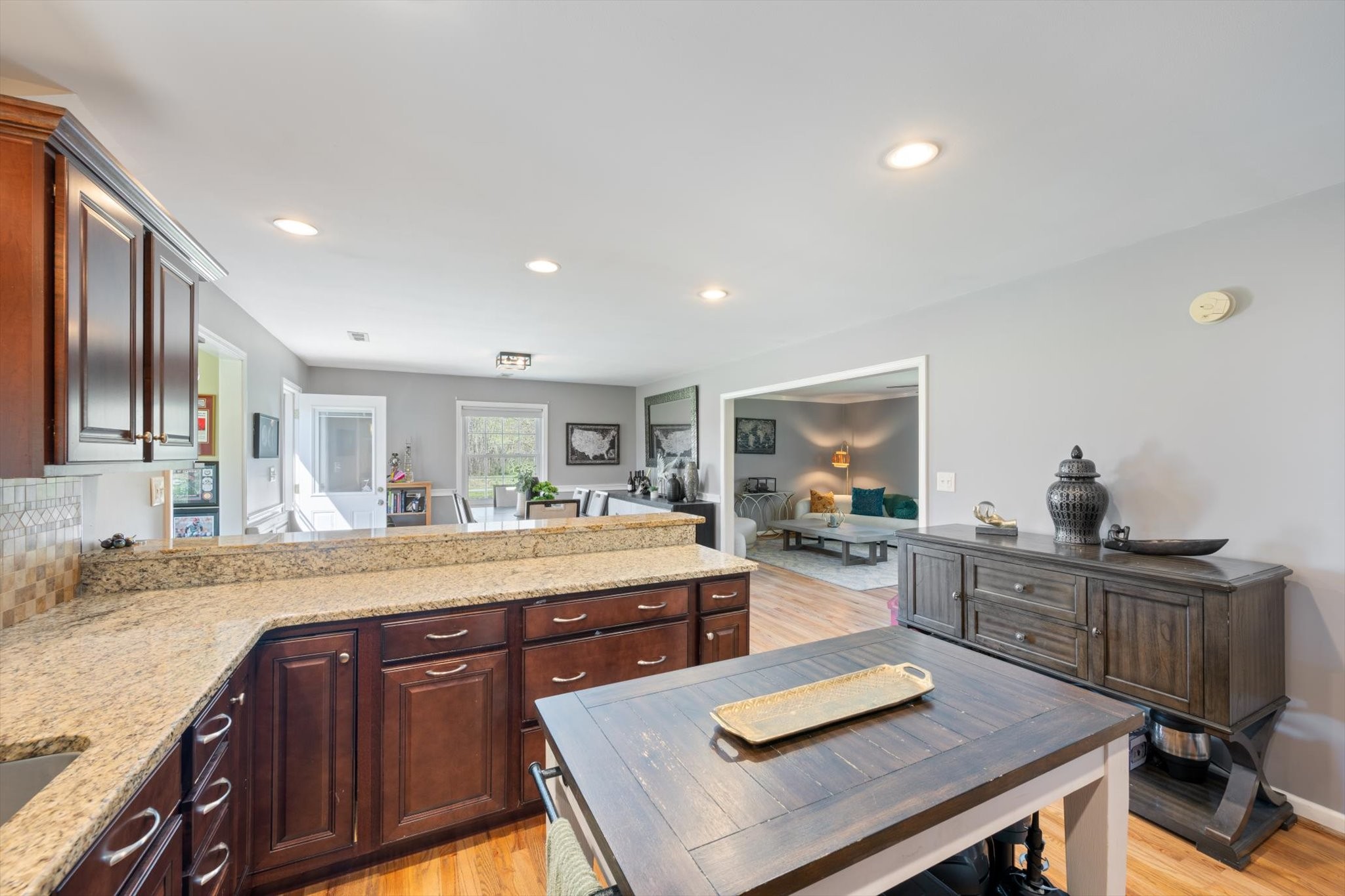 501 Chapmansboro Road Ashland City, TN 37015 - Photo 10 of 36 a kitchen with a stove a refrigerator and a dining table