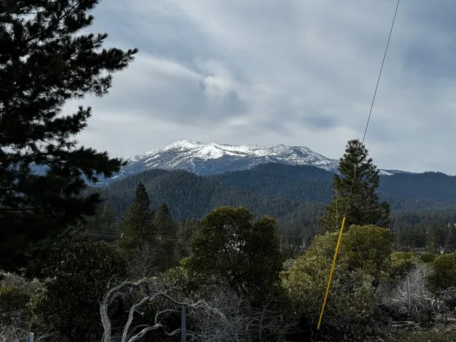 a view of a lake with a mountain in the background