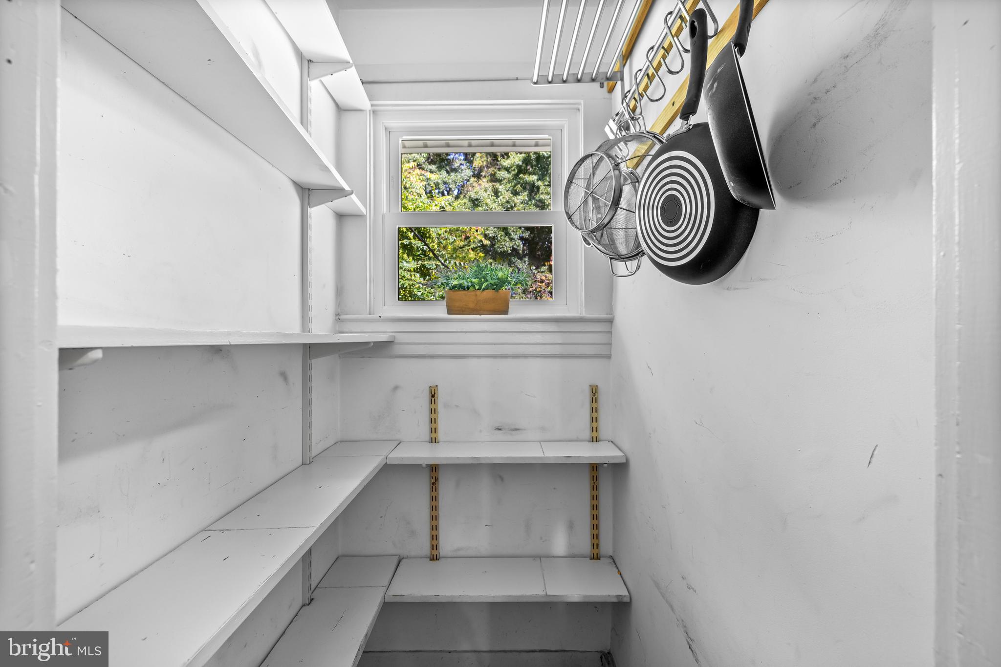 4406 Mainfield Avenue Baltimore, MD 21214 - Photo 17 of 47 a view of small space with racks on the wall