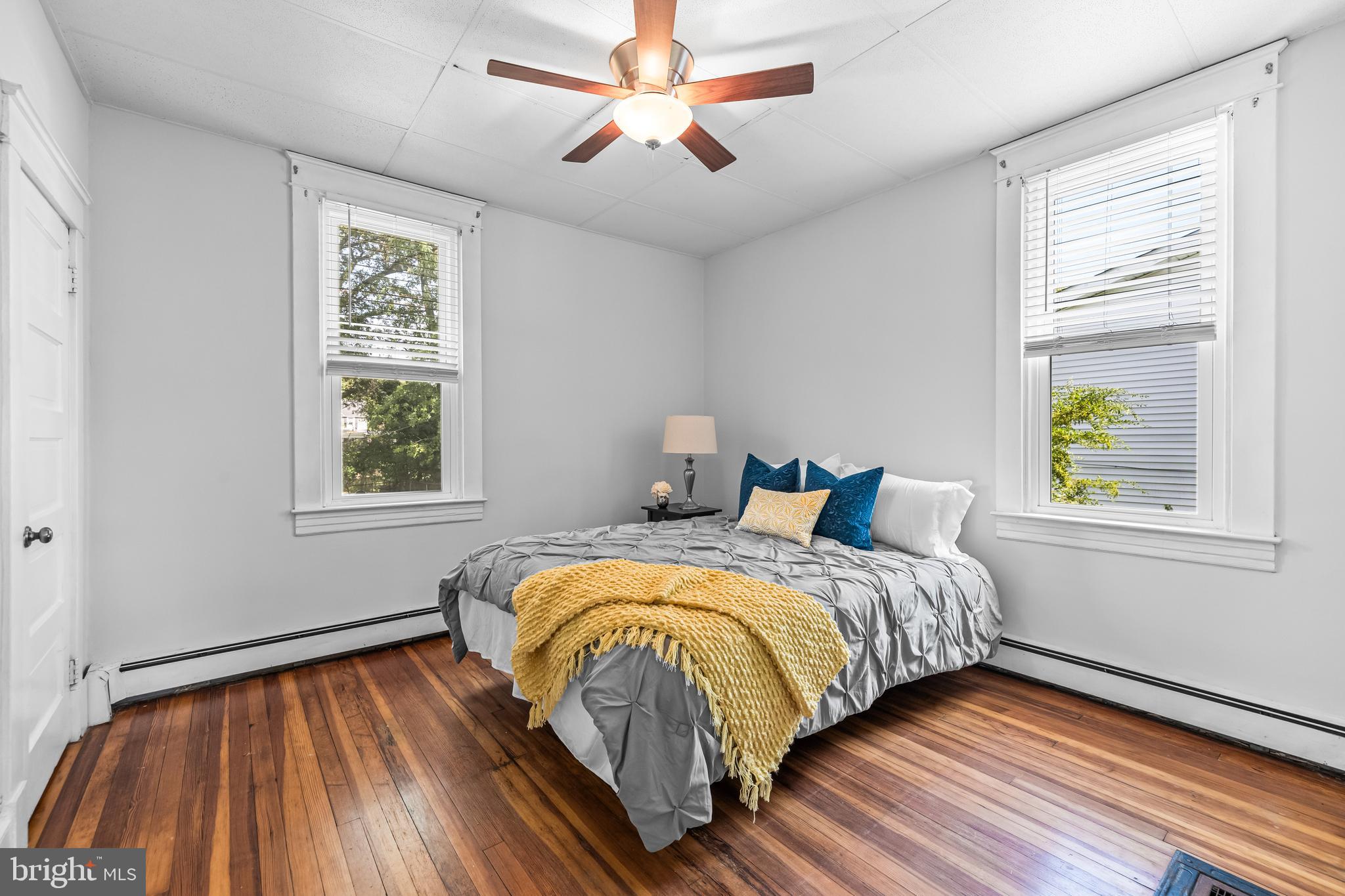 4406 Mainfield Avenue Baltimore, MD 21214 - Photo 18 of 47 a bedroom with a bed and a window