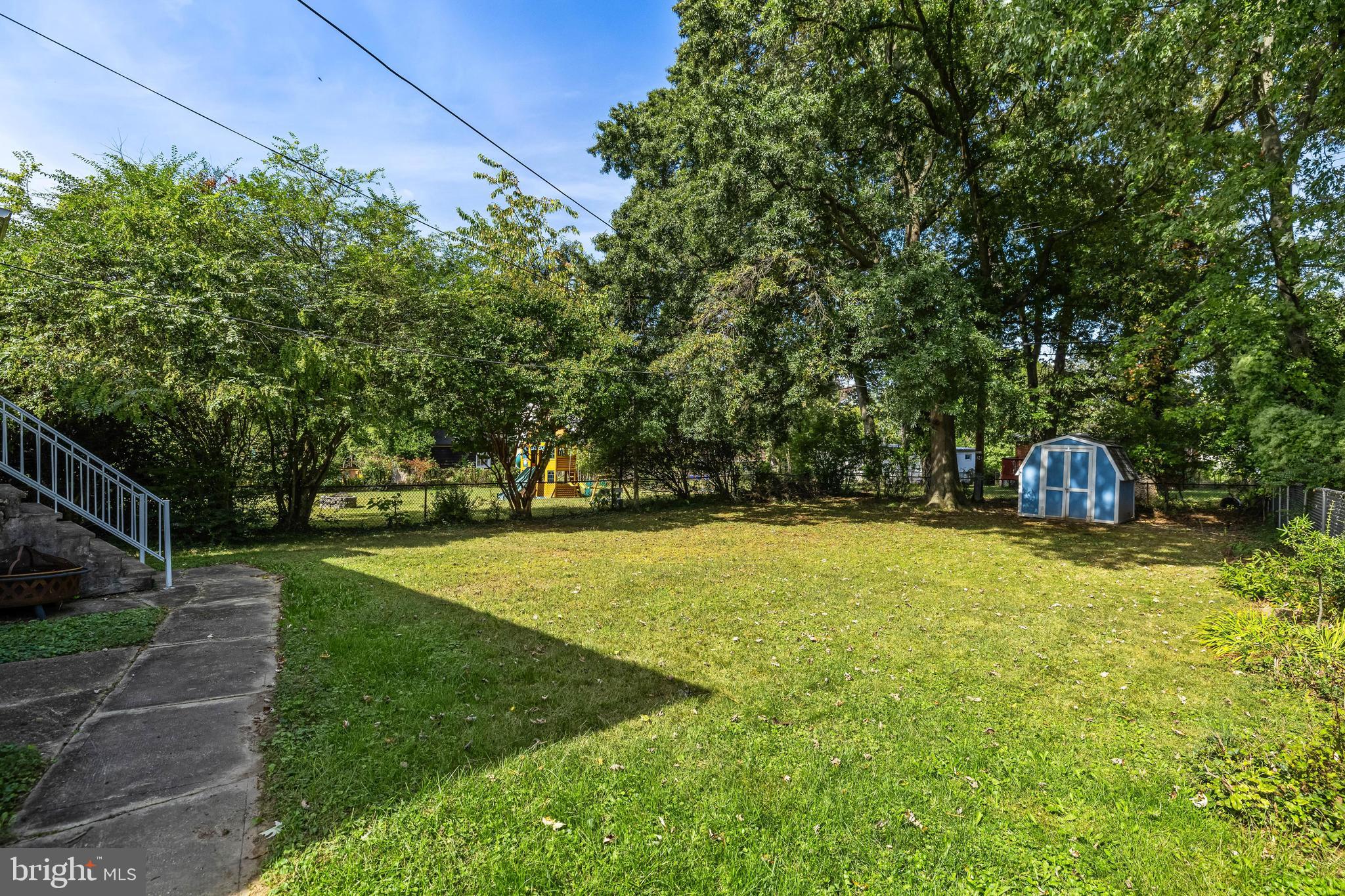 4406 Mainfield Avenue Baltimore, MD 21214 - Photo 37 of 47 a view of a yard with a trees