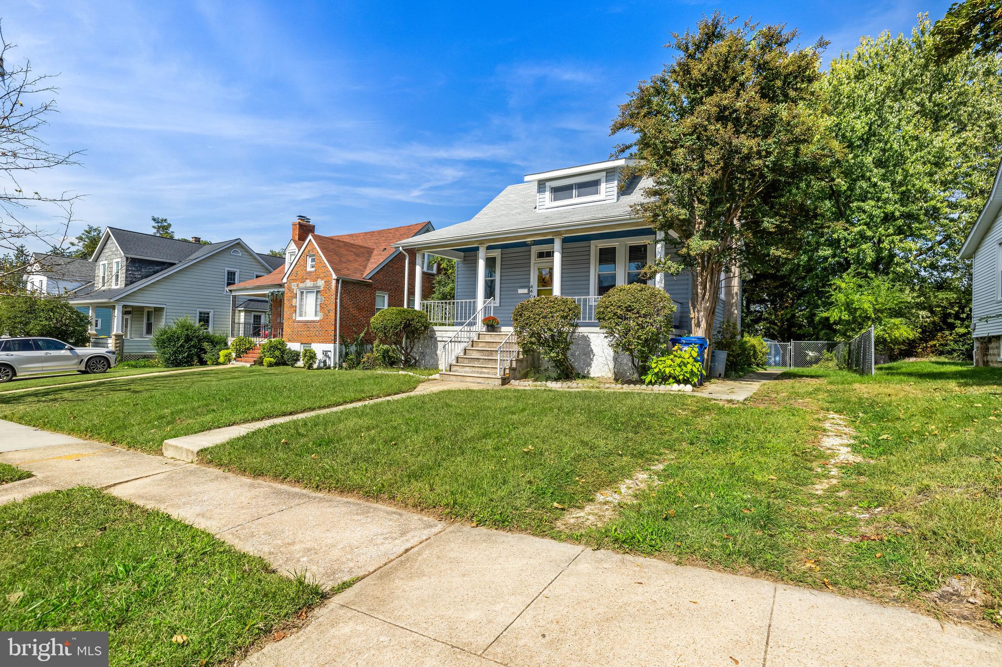 4406 Mainfield Avenue Baltimore, MD 21214 - Photo 43 of 47 a front view of a house with garden