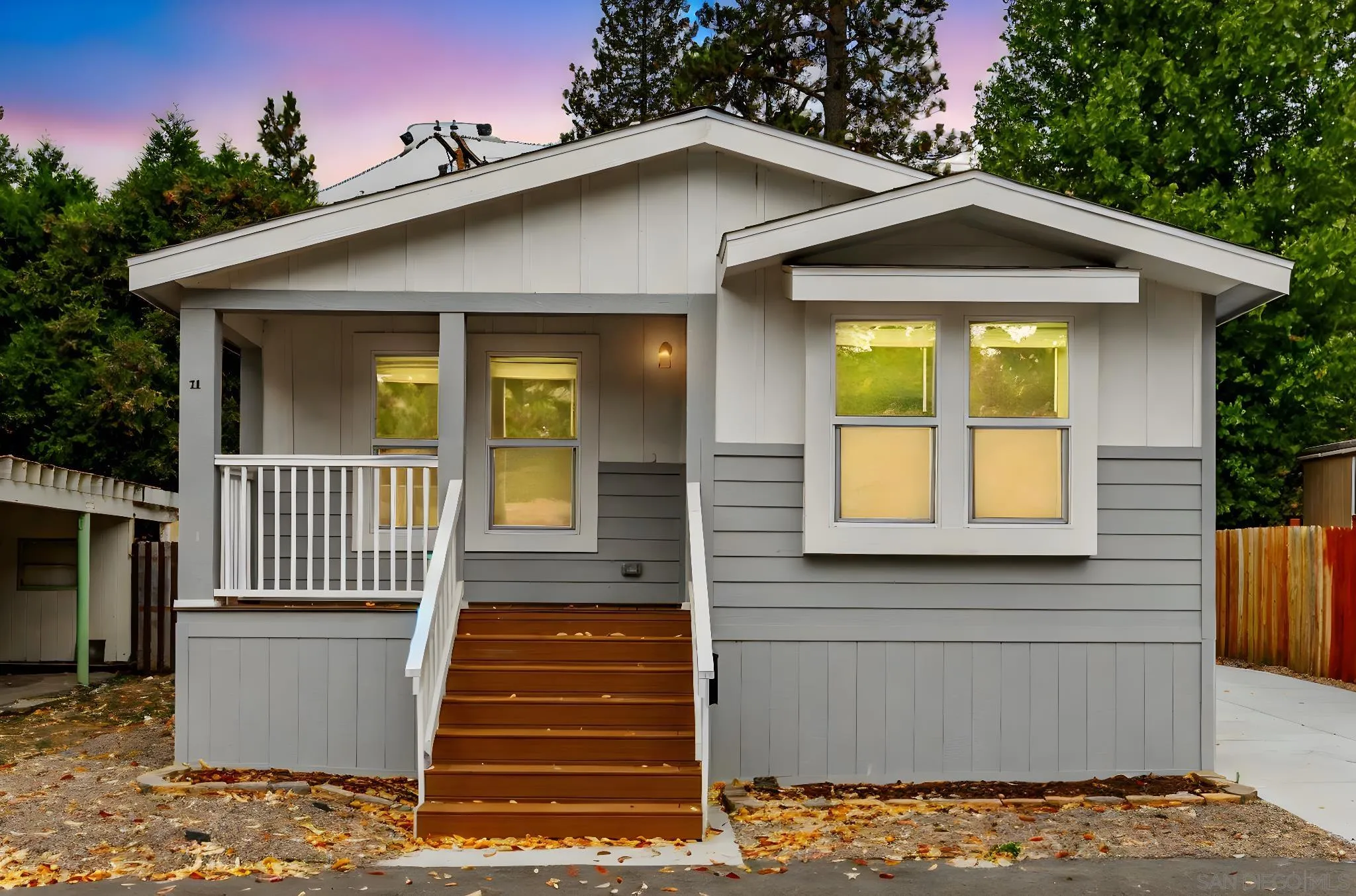 22899 Byron Road, Unit 11 Crestline, CA 92325 - Photo 16 of 25 a front view of a house with a yard