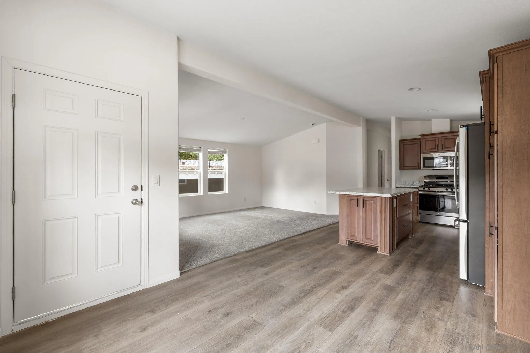 22899 Byron Road, Unit 11 Crestline, CA 92325 - Photo 9 of 25 a view of kitchen with furniture and wooden floor