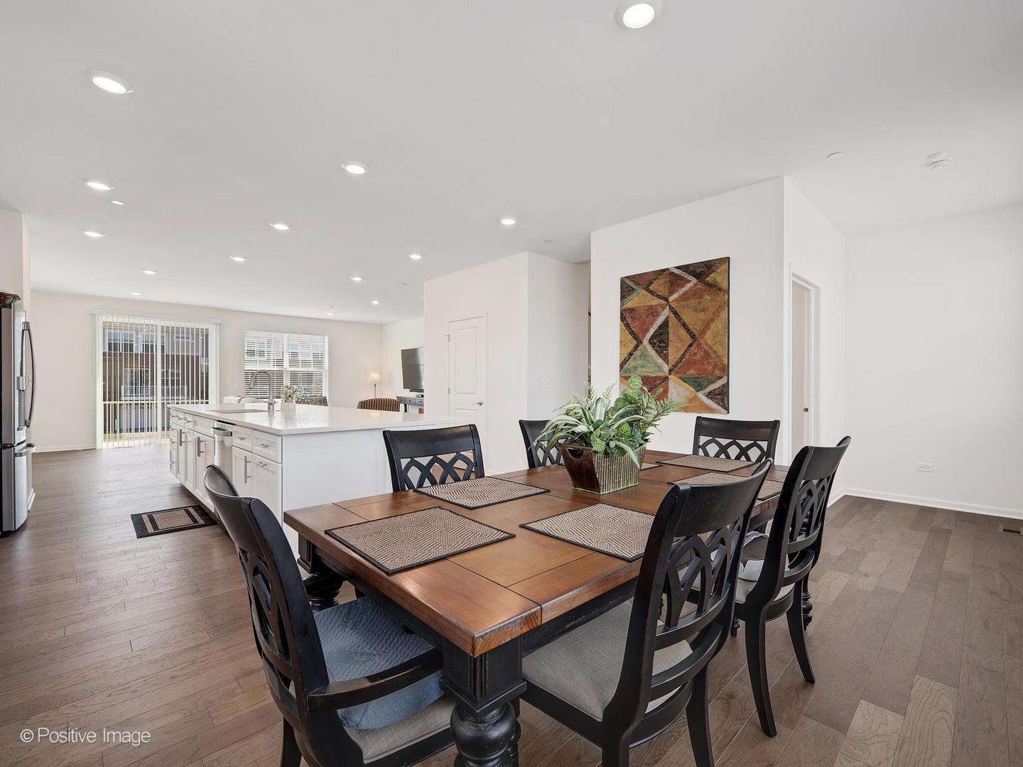 2950 Reflection Drive Naperville, IL 60564 - Photo 11 of 32 a view of a dining room with furniture window and wooden floor