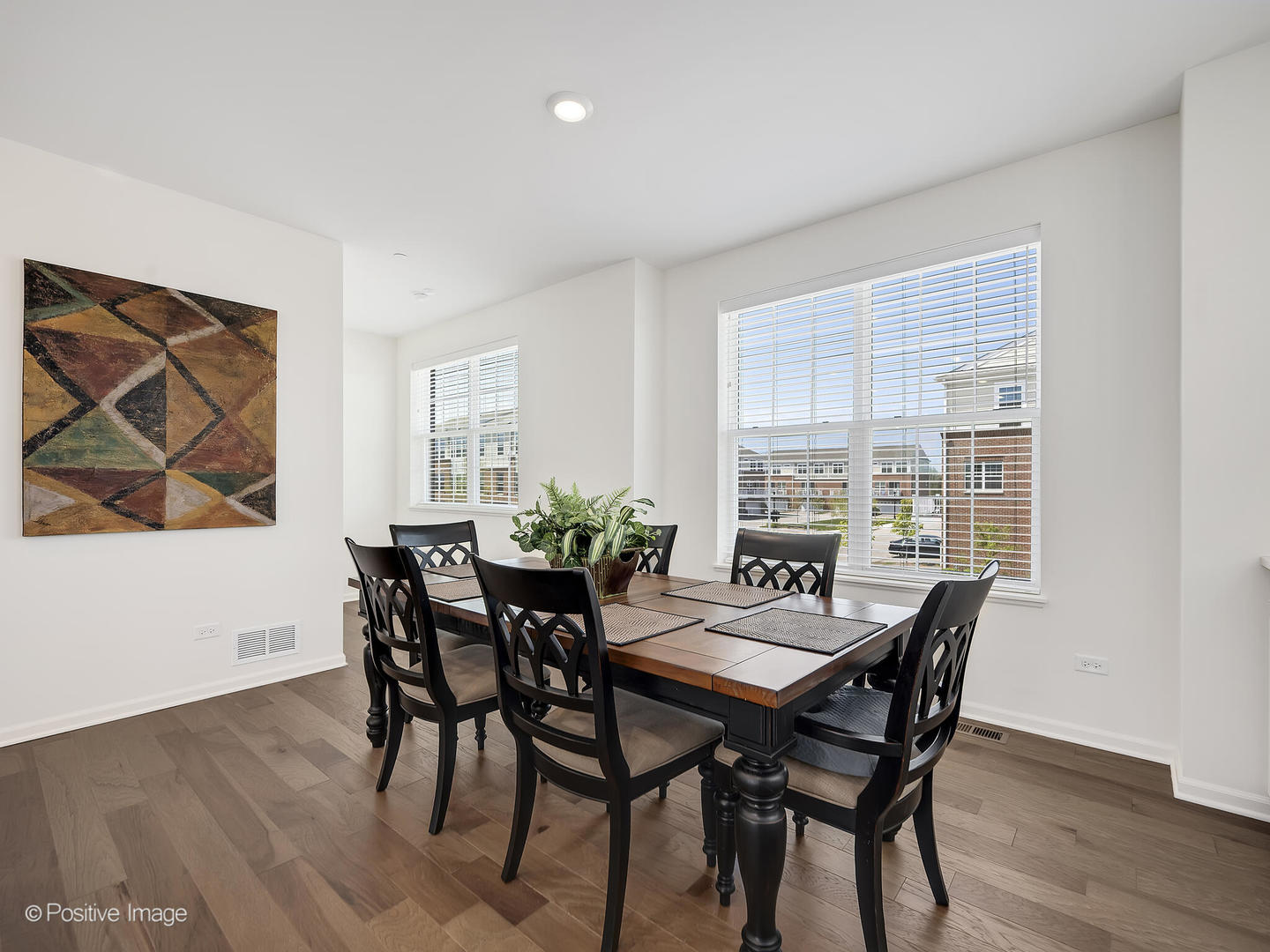 2950 Reflection Drive Naperville, IL 60564 - Photo 12 of 32 a view of a dining room with furniture and wooden floor