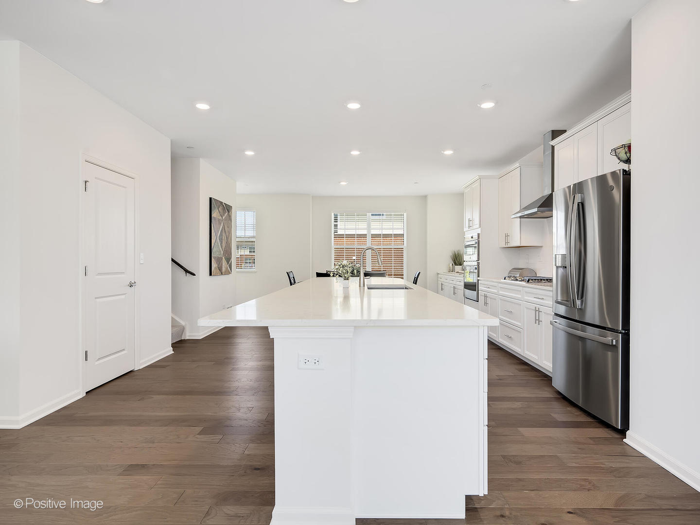 2950 Reflection Drive Naperville, IL 60564 - Photo 13 of 32 a view of kitchen with center island and stainless steel appliances