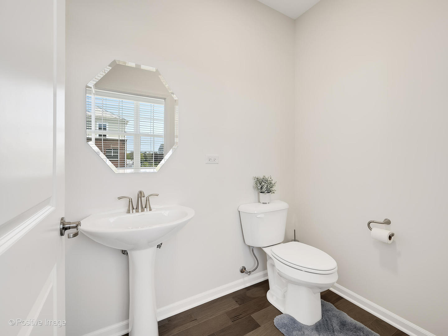 2950 Reflection Drive Naperville, IL 60564 - Photo 19 of 32 a bathroom with a toilet sink and mirror