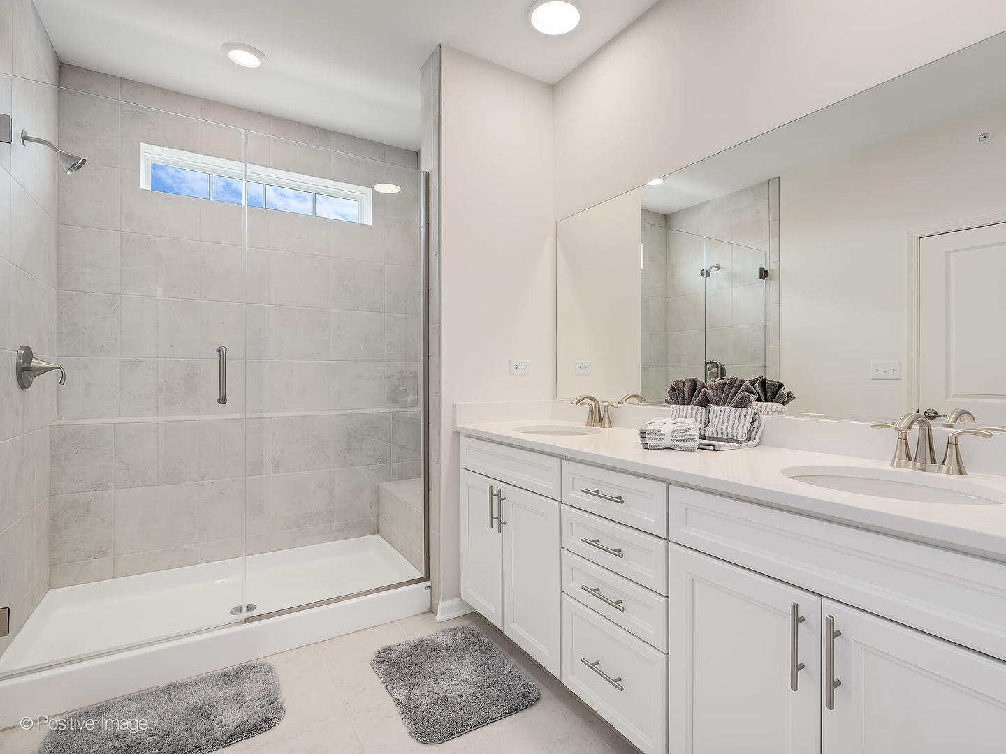 2950 Reflection Drive Naperville, IL 60564 - Photo 21 of 32 a bathroom with double sink and a mirror