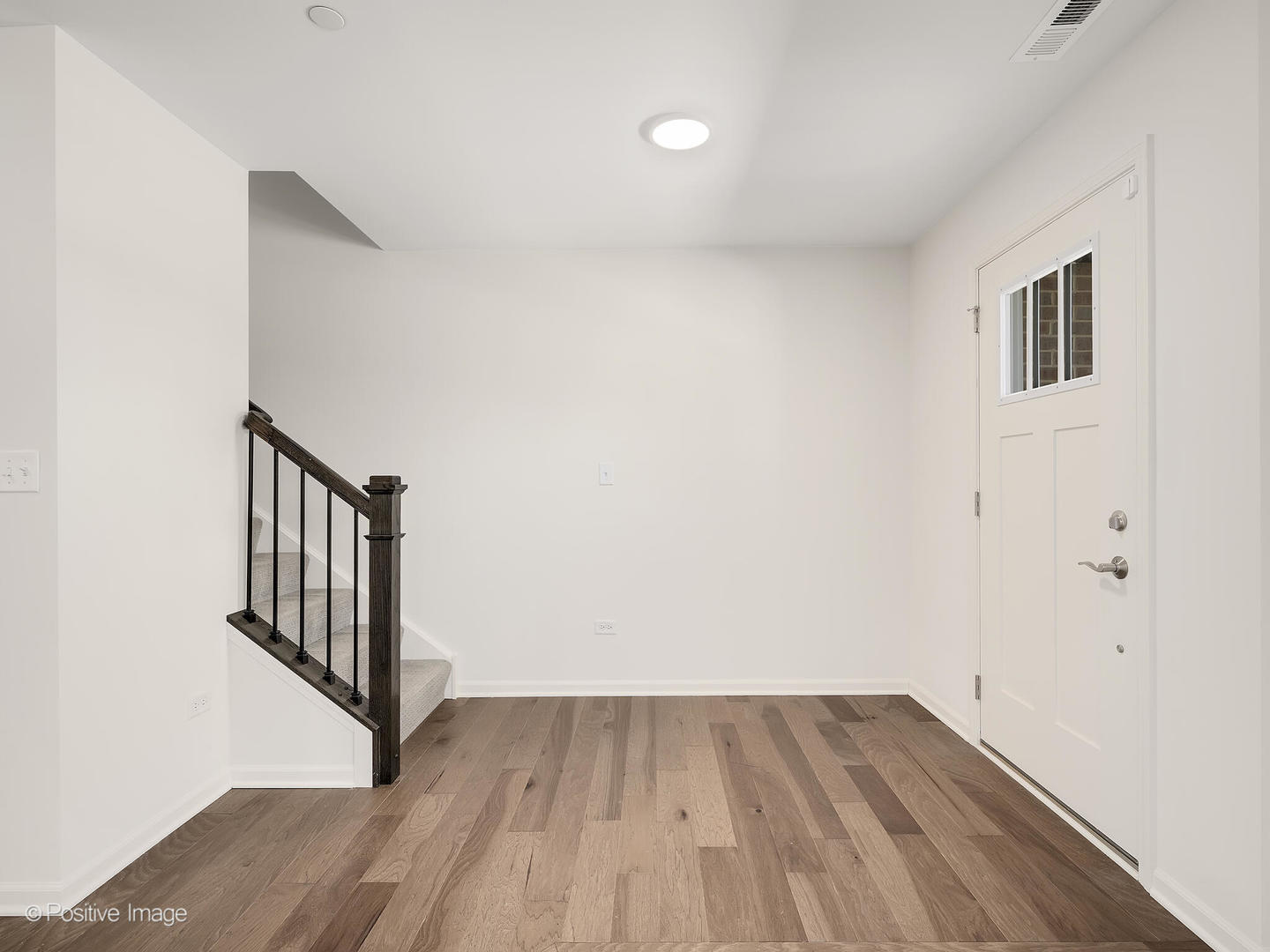 2950 Reflection Drive Naperville, IL 60564 - Photo 3 of 32 a view of hallway with wooden floor
