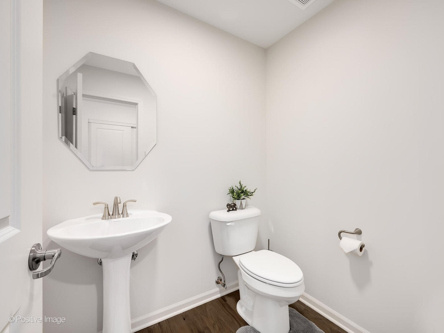 2950 Reflection Drive Naperville, IL 60564 - Photo 5 of 32 a white toilet sitting next to a bathroom sink