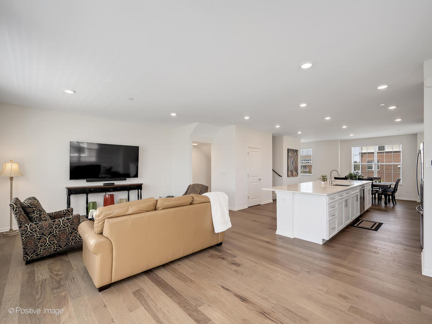 2950 Reflection Drive Naperville, IL 60564 - Photo 6 of 32 a living room with furniture and a flat screen tv