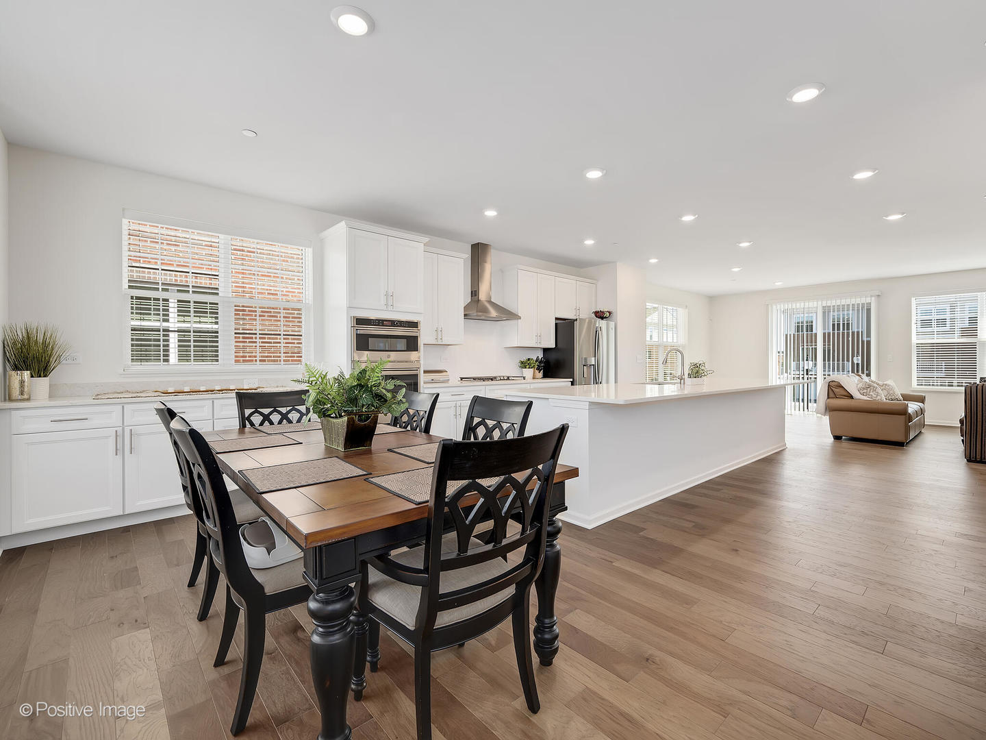 2950 Reflection Drive Naperville, IL 60564 - Photo 10 of 32 a view of a dining room with furniture and wooden floor