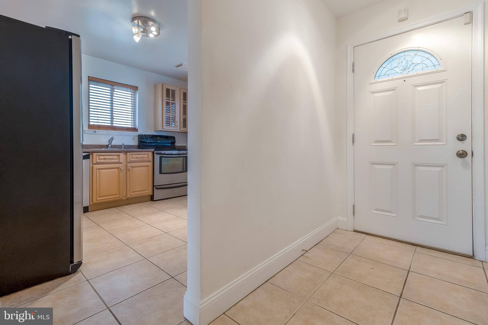 4709 Sargent Road Northeast Washington, DC 20017 - Photo 3 of 28 view of main floor tile entryway