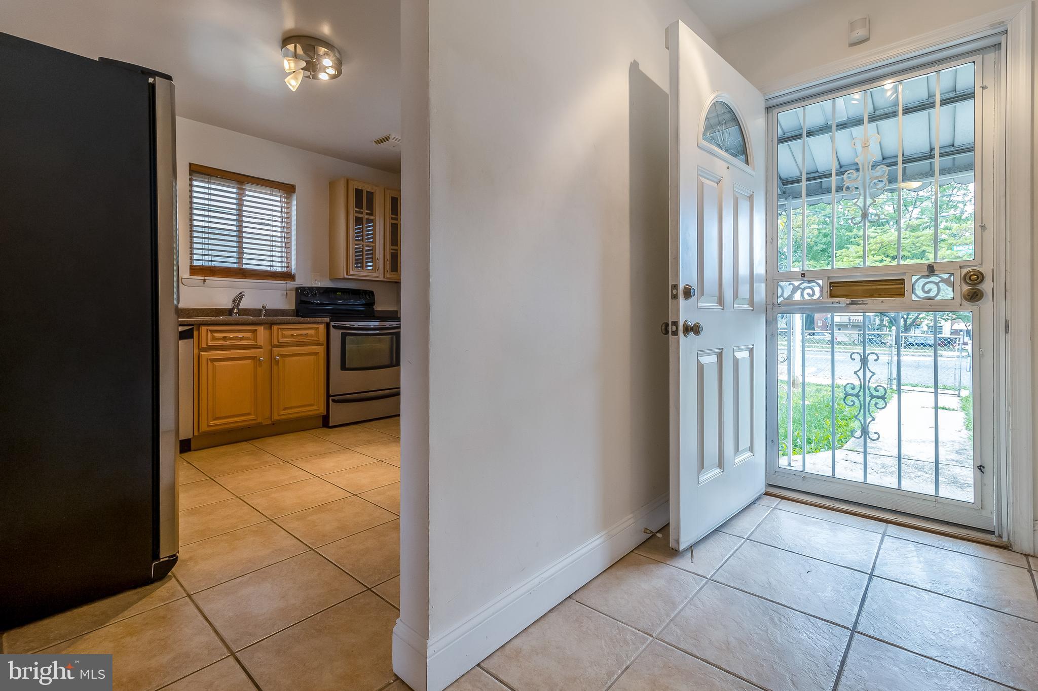 4709 Sargent Road Northeast Washington, DC 20017 - Photo 4 of 28 view of entryway and wrought iron door