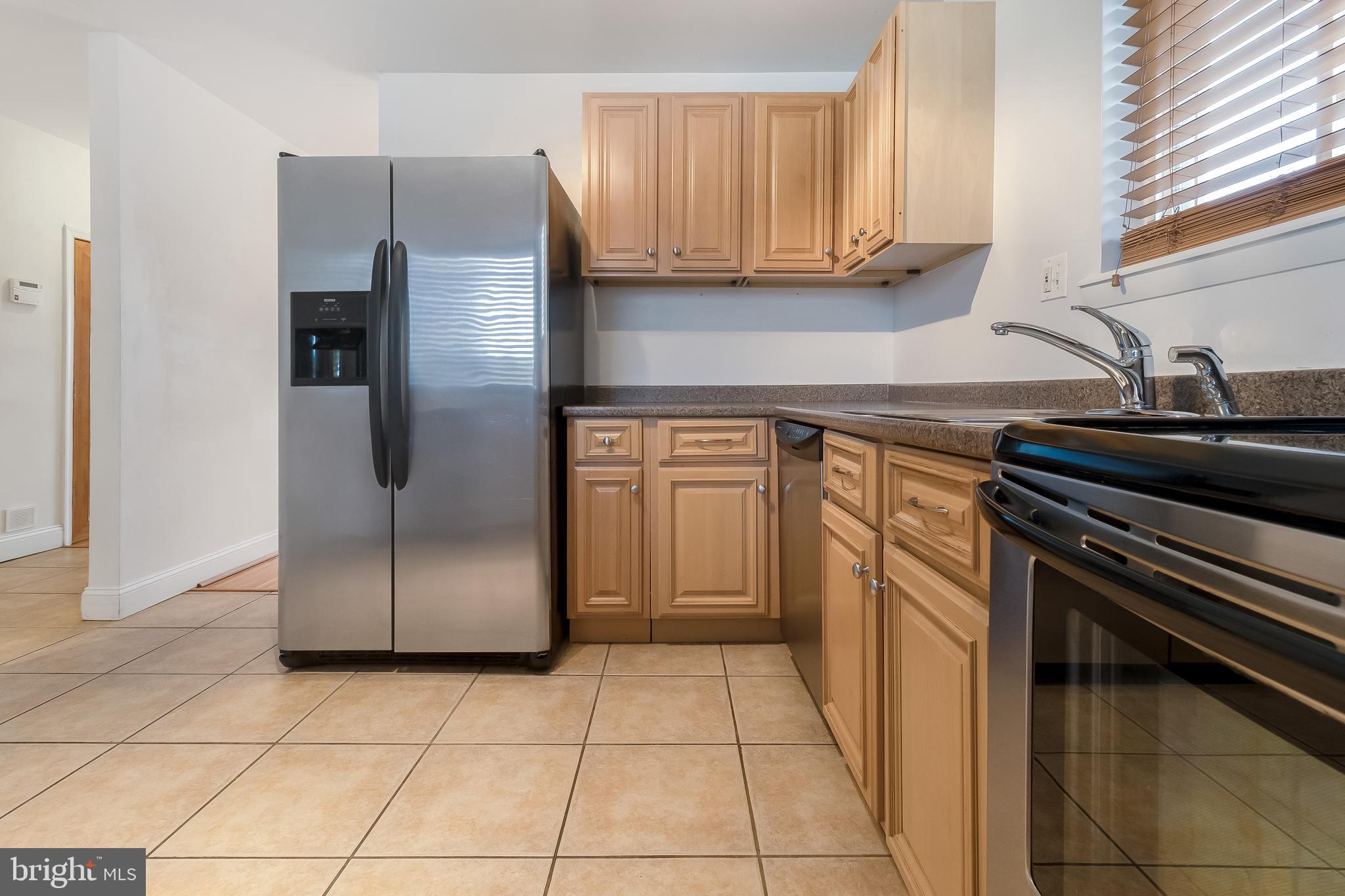4709 Sargent Road Northeast Washington, DC 20017 - Photo 7 of 28 add'l view of kitchen w/access do dining area