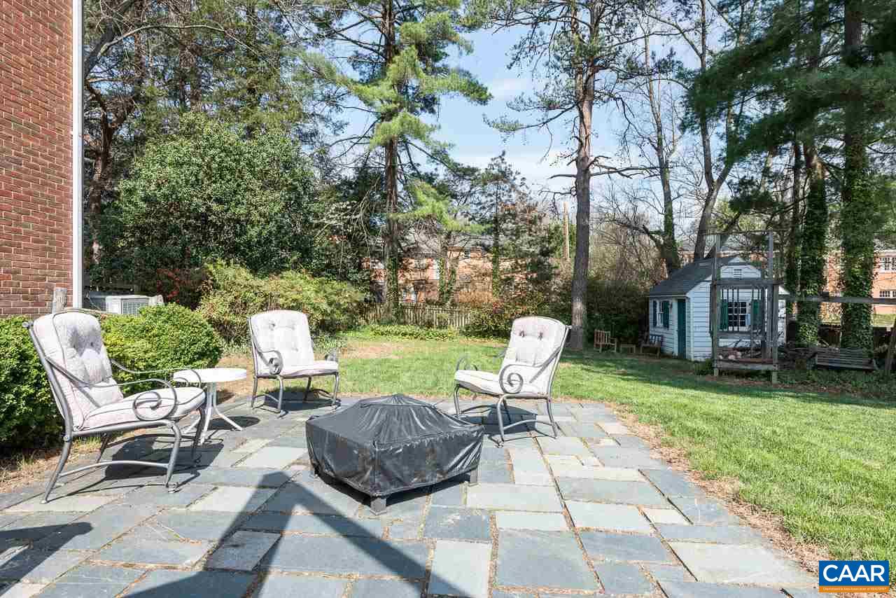 2500 South Bennington Road Charlottesville, VA 22901 - Photo 20 of 33 a view of a chairs and table in backyard of the house
