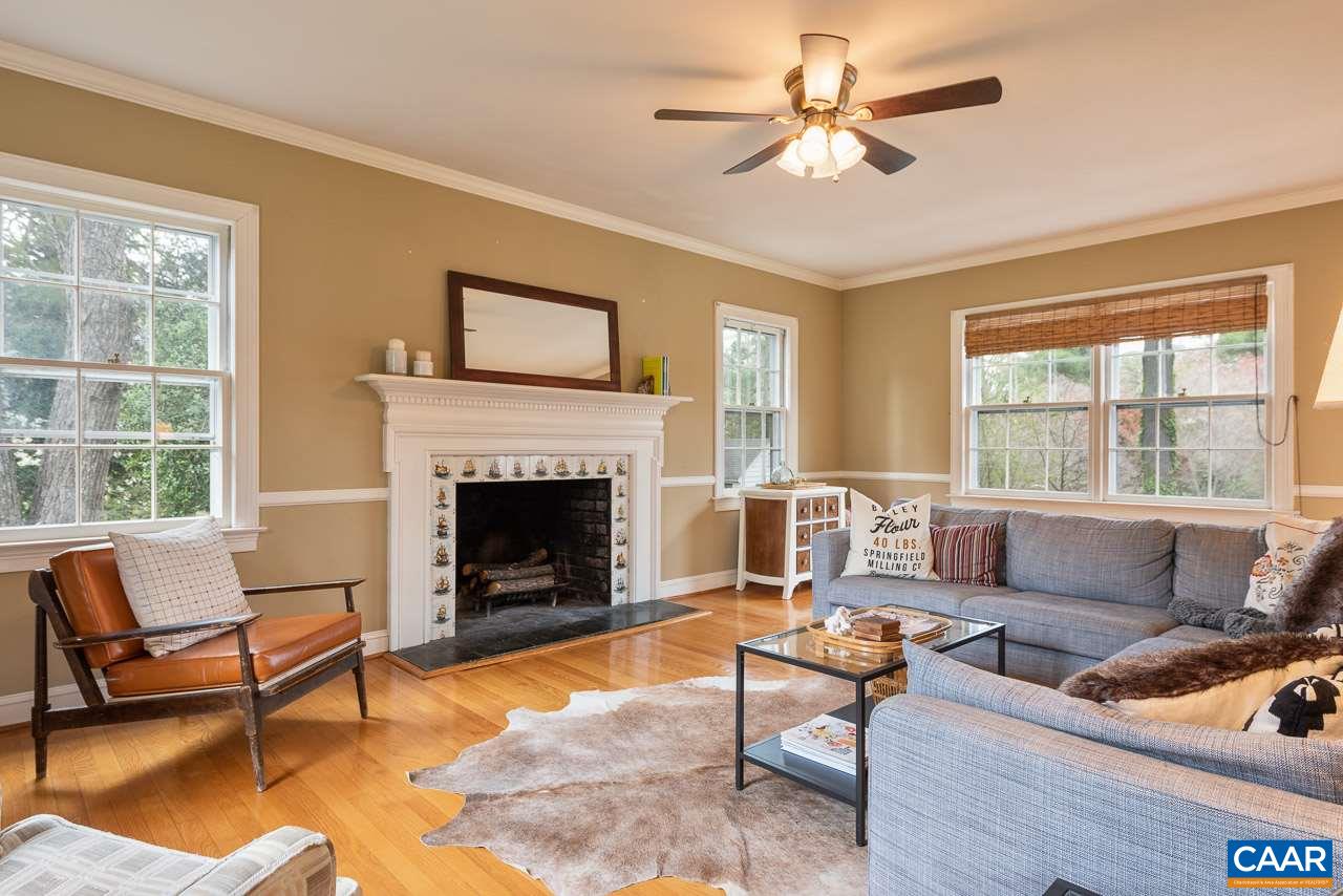 2500 South Bennington Road Charlottesville, VA 22901 - Photo 3 of 33 a living room with furniture a fireplace and a large window
