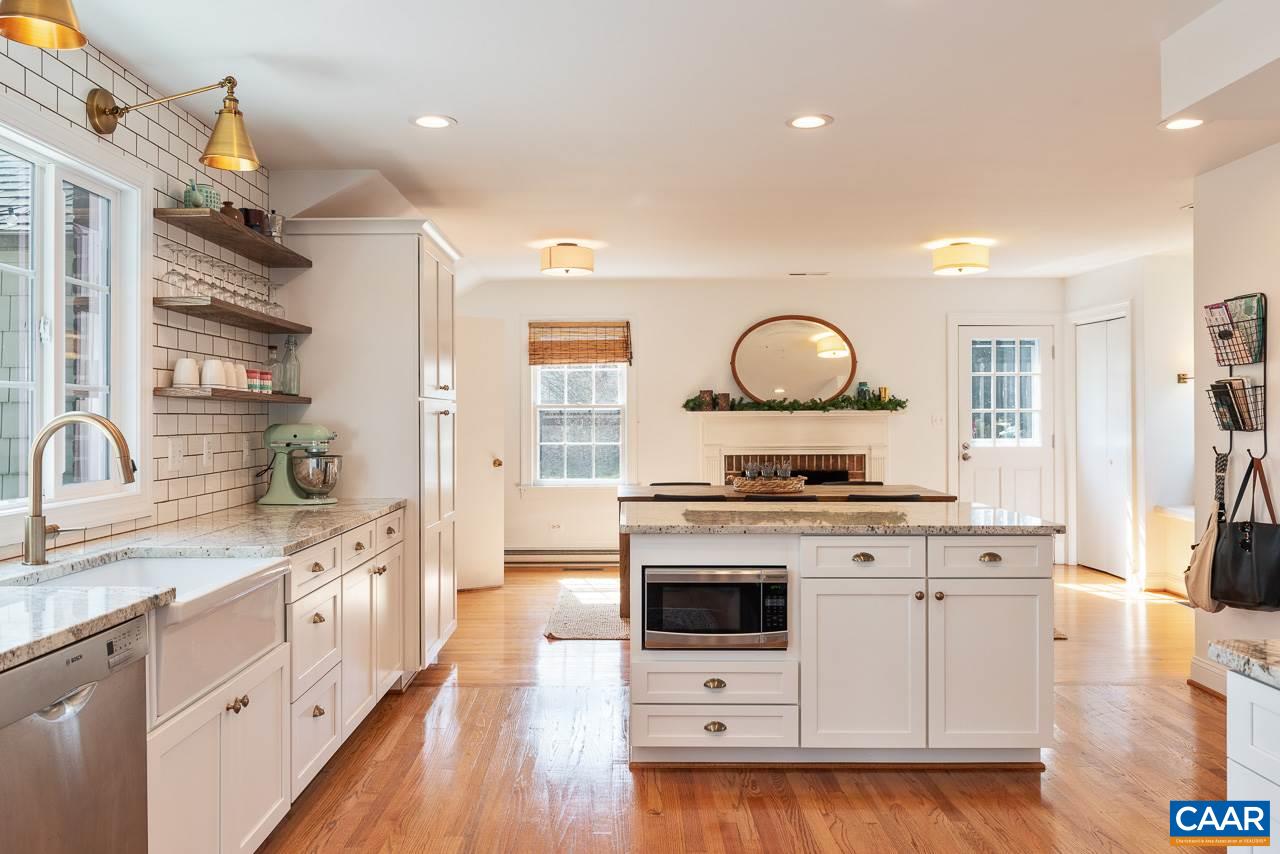 2500 South Bennington Road Charlottesville, VA 22901 - Photo 6 of 33 a kitchen with a stove top oven sink and cabinets