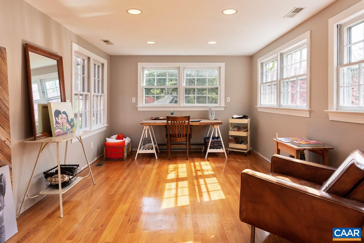 2500 South Bennington Road Charlottesville, VA 22901 - Photo 10 of 33 a living room with furniture a wooden floor and a table