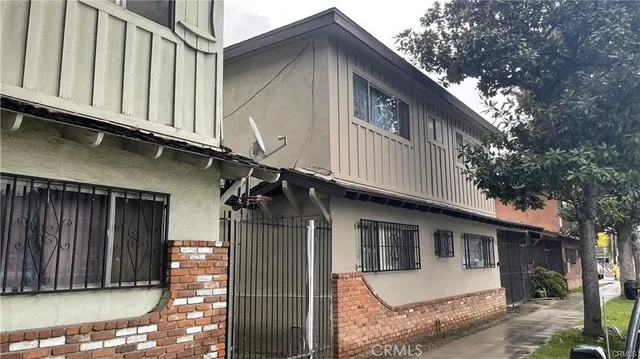 a front view of a house with a garage