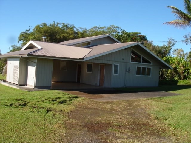 2215 Kaiwiki Road Hilo, HI 96720 - Photo 2 of 30 a house view with a garden space