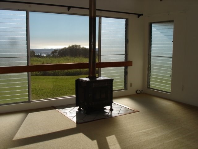 2215 Kaiwiki Road Hilo, HI 96720 - Photo 8 of 30 a view of a floor to ceiling window and an outdoor view
