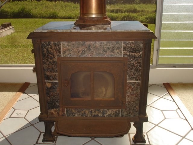 2215 Kaiwiki Road Hilo, HI 96720 - Photo 10 of 30 a close view of a fireplace in an outdoor space