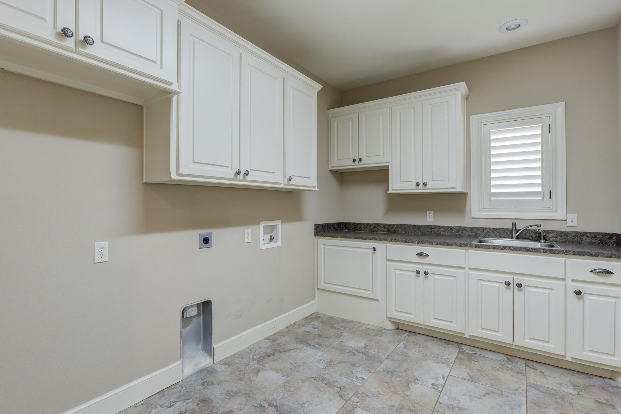 6017 87th Street Lubbock, TX 79424 - Photo 29 of 62 Laundry Storage