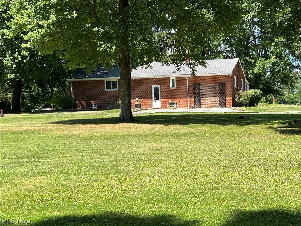 13604 Alexander Road Cleveland, OH 44125 - Photo 10 of 49 Back of house featuring the yard