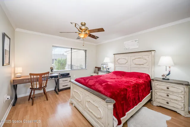 a bed room with a bed and a table