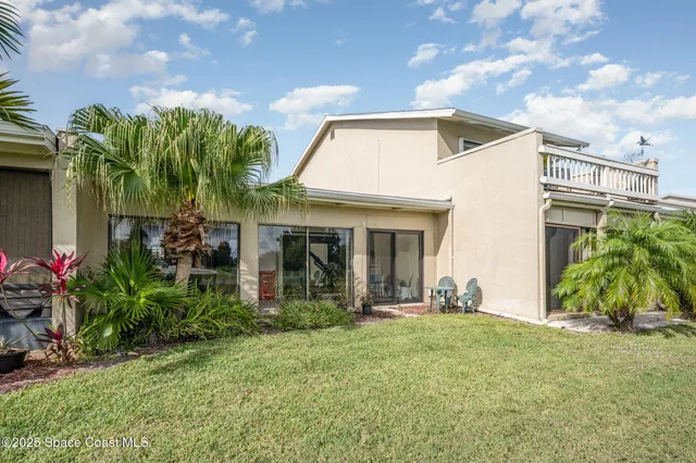 a front view of house with yard