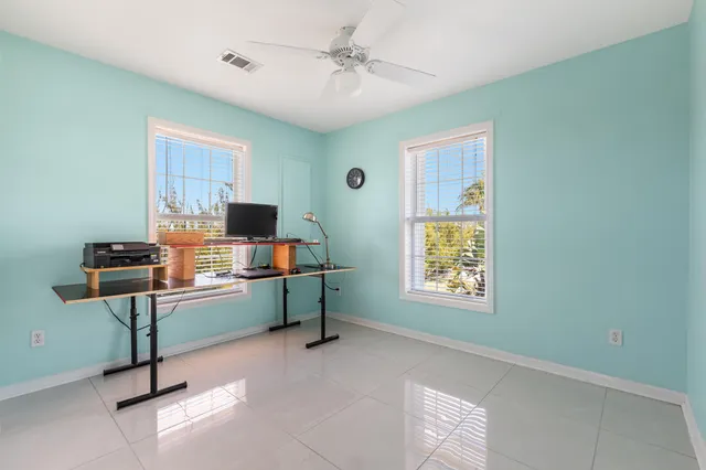 a view of livingroom with workspace