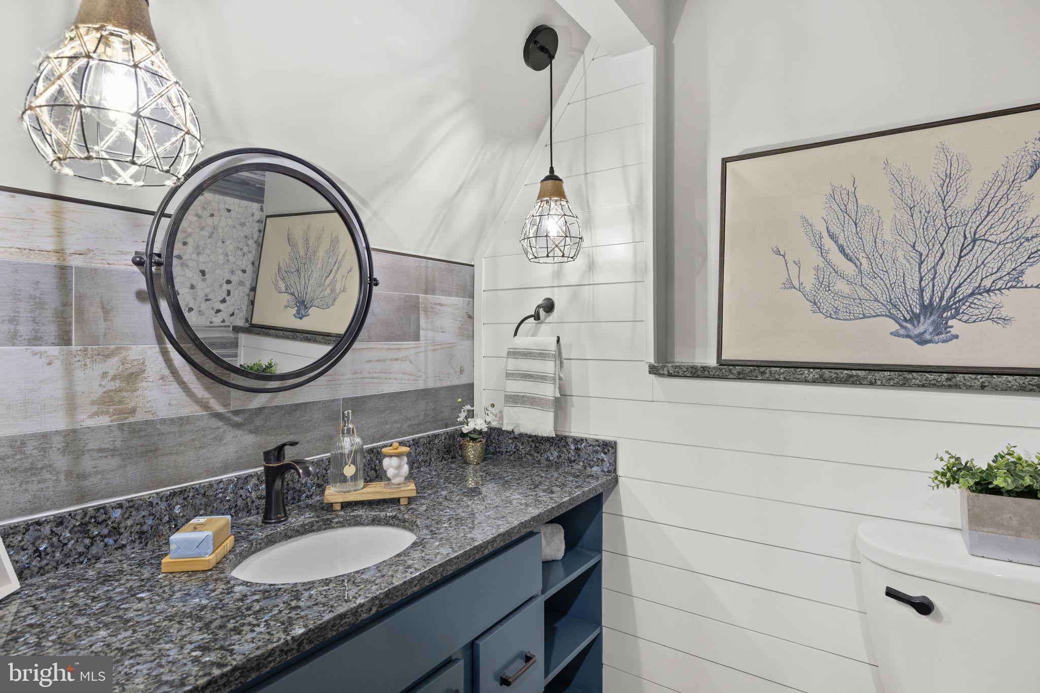 151 Harrison Circle Locust Grove, VA 22508 - Photo 37 of 83 a bathroom with a granite countertop sink and a mirror