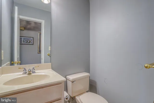 a bedroom with a bed dresser and a window