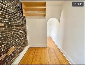 256 Withers Street Brooklyn, NY 11211 - Photo 4 of 14 a view of a bathroom with wooden floor