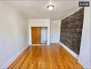 256 Withers Street Brooklyn, NY 11211 - Photo 5 of 14 a view of wooden floor in a room