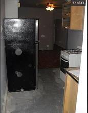 256 Withers Street Brooklyn, NY 11211 - Photo 9 of 14 a refrigerator freezer and a stove