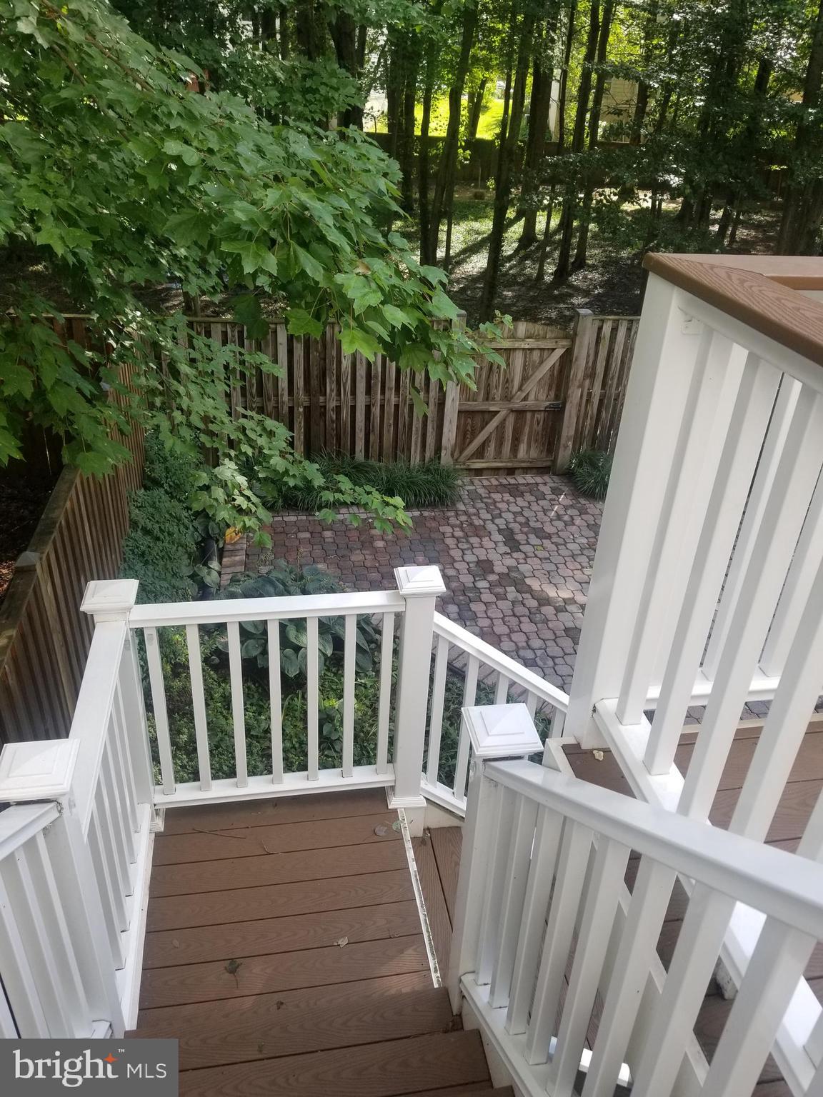 141 Roland Court Southwest Vienna, VA 22180 - Photo 22 of 32 Deck leading to the patio below