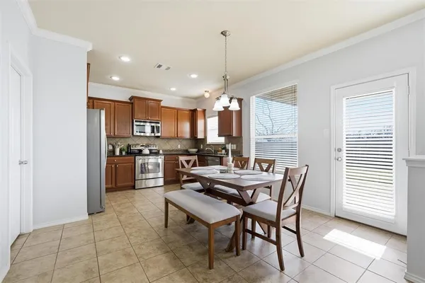 a view of a dining room with furniture