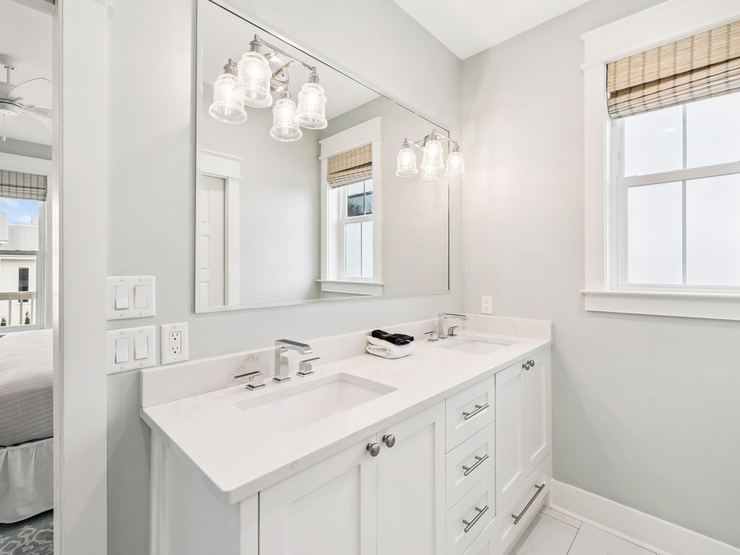 29 Tidewater Ct Inlet Beach Inlet Beach, FL 32461 - Photo 15 of 25 a bathroom with a sink a vanity and a mirror