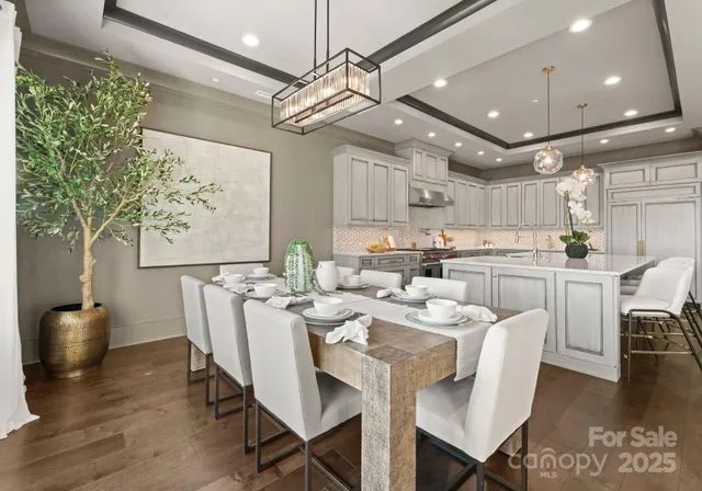 a kitchen with stainless steel appliances granite countertop lots of counter top space