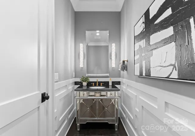 a living room with a couch and a floor to ceiling window