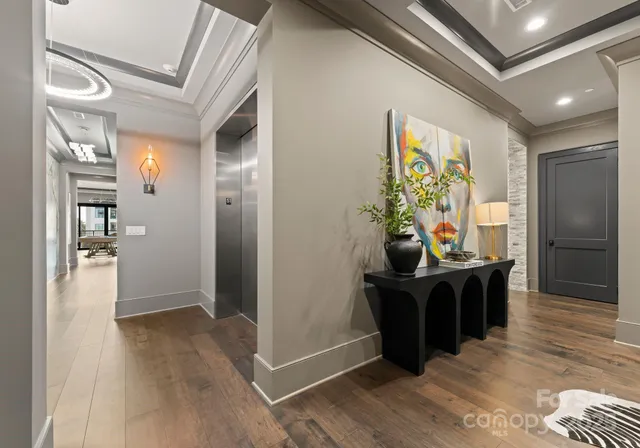 a bathroom with a sink and a mirror with bathtub