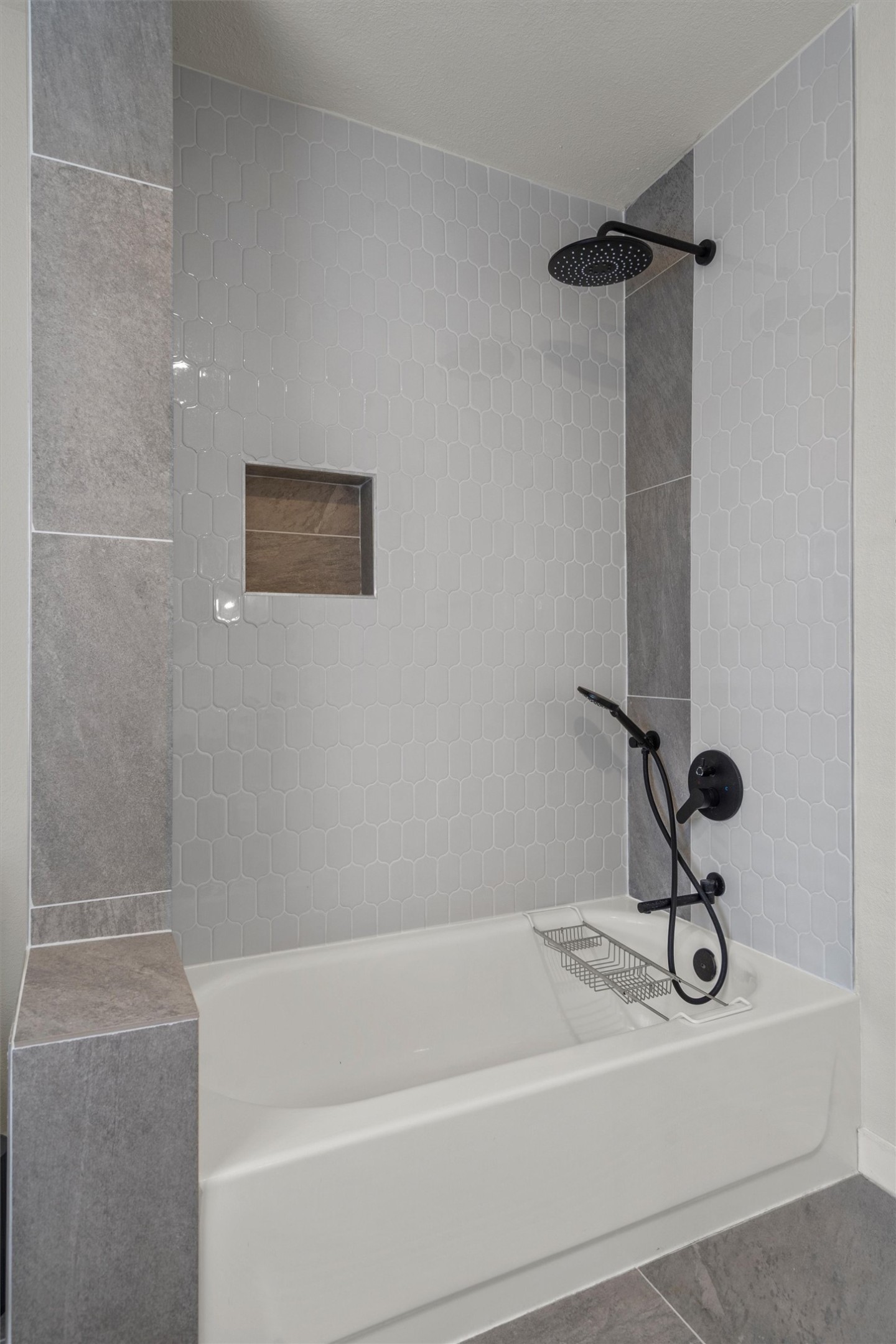 836 Cottle Town Road Smithville, TX 78957 - Photo 29 of 40 Bathroom featuring bathing tub / shower combination and tile patterned floors